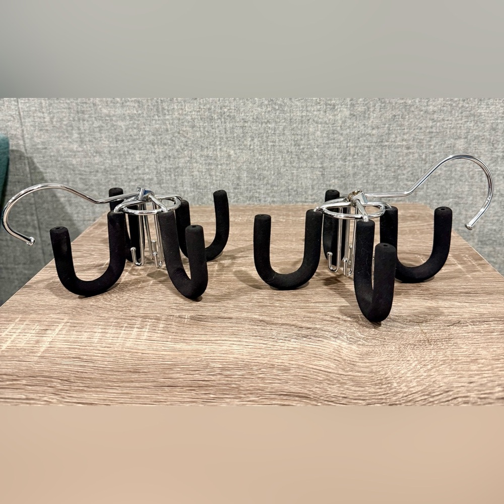 Set of 2, swivel belt hanger. Heavy padded hooks. With 4 small & 4 large hooks